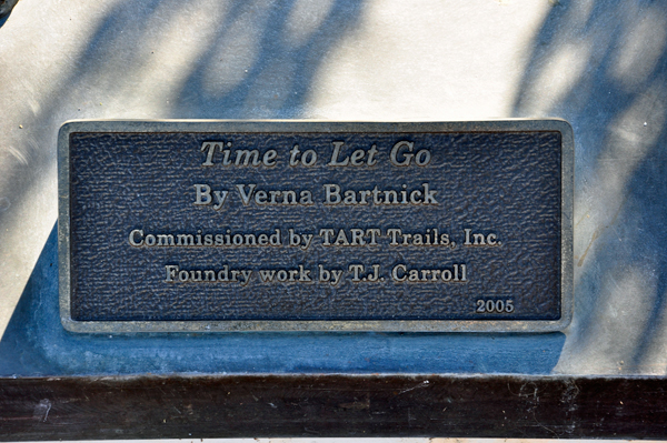 plaque: Time to Let Go statue